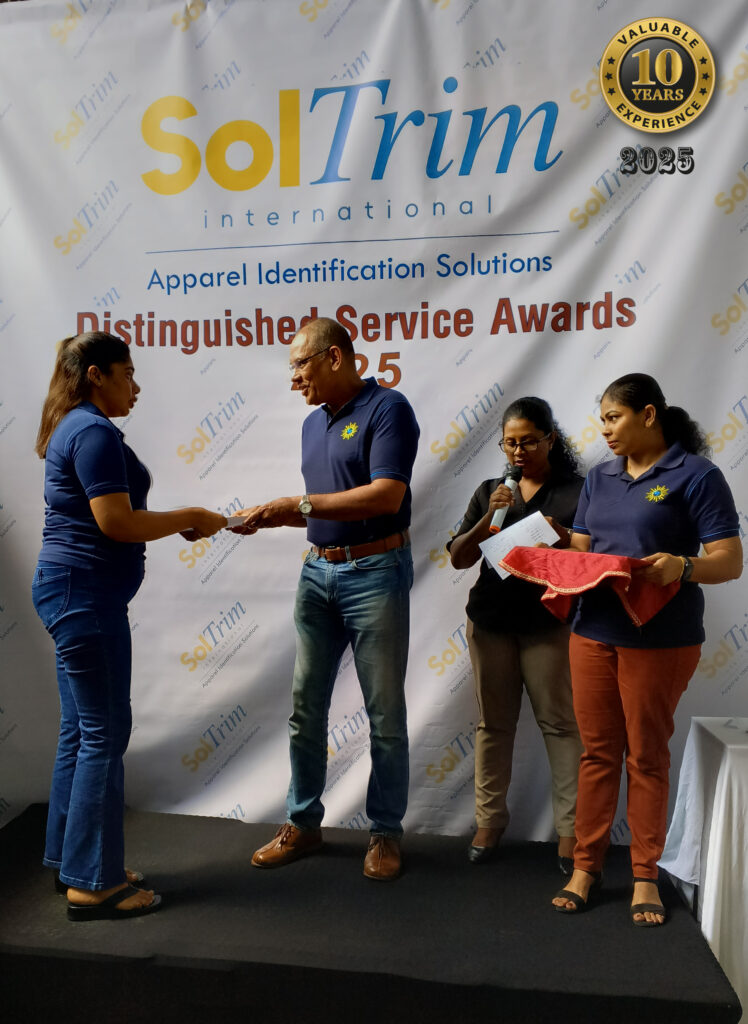 Handing over 300 Tree Plants to staff members to encourage reforestation