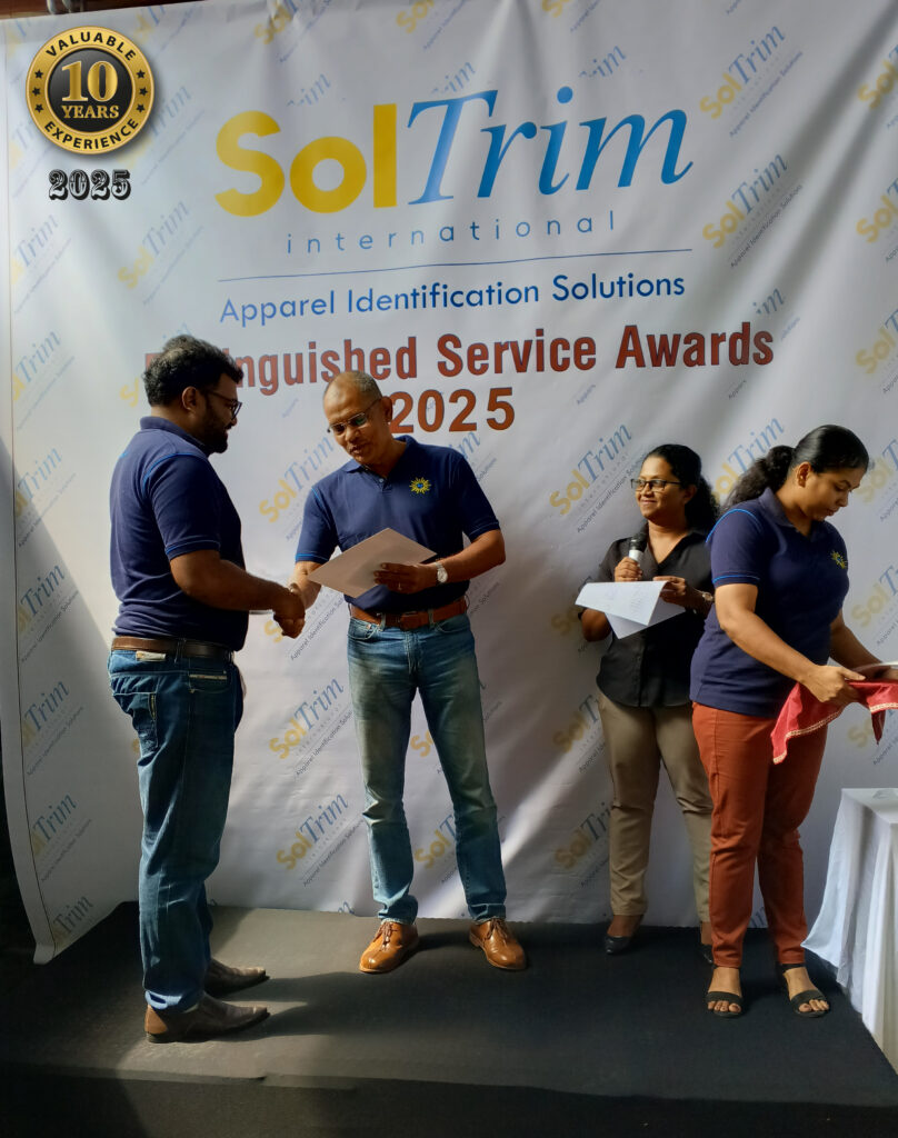 Handing over 300 Tree Plants to staff members to encourage reforestation