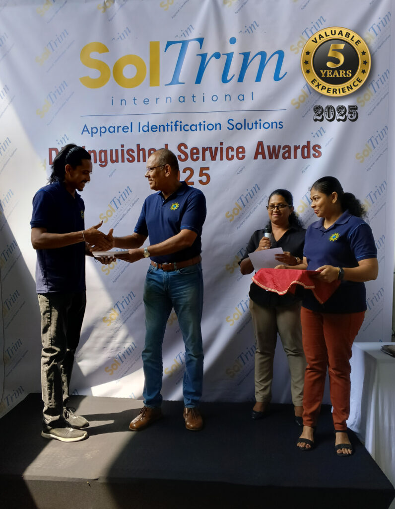Handing over 300 Tree Plants to staff members to encourage reforestation